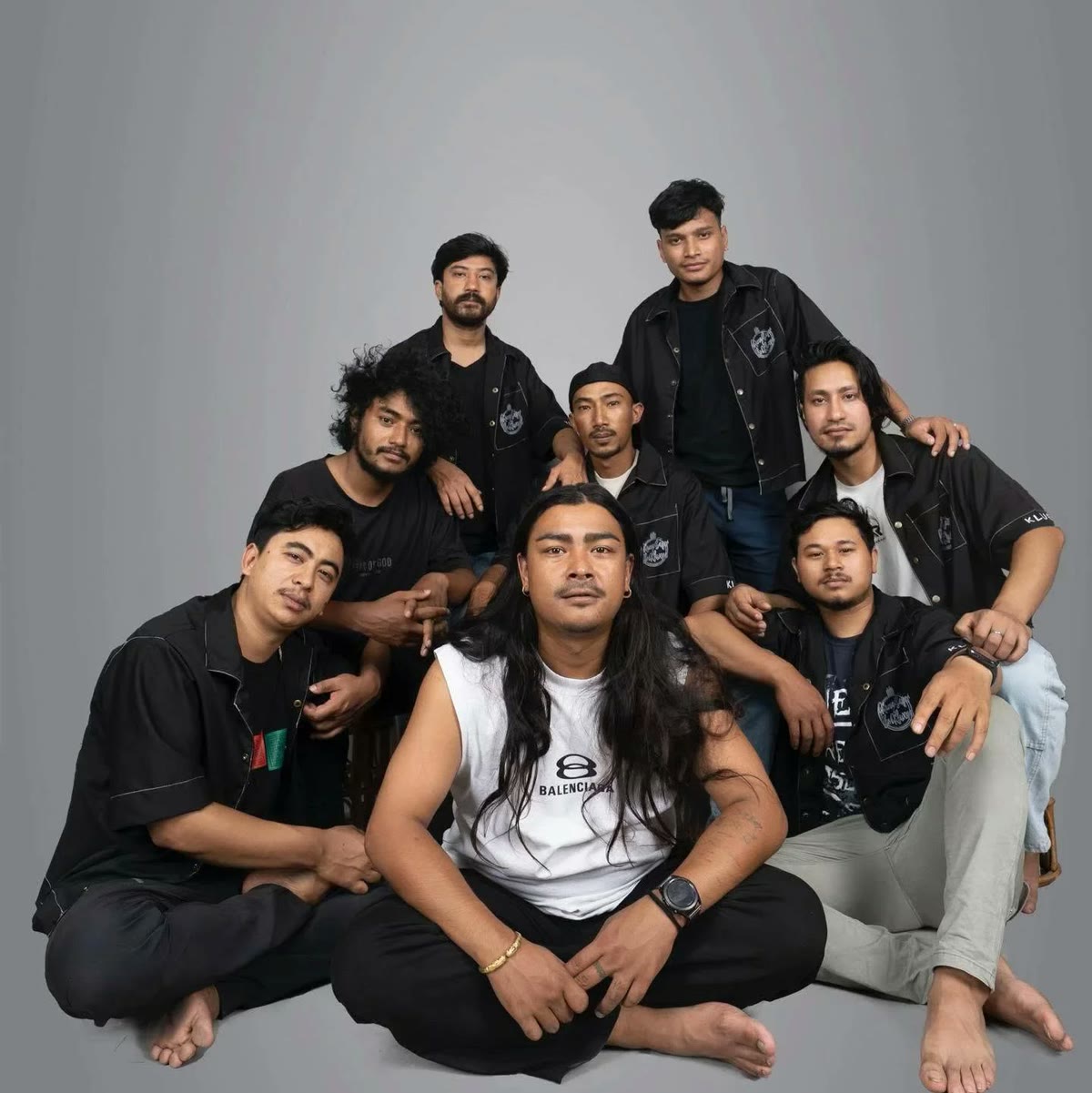 Kuma Sagar seated with the members of The Khwopa Band